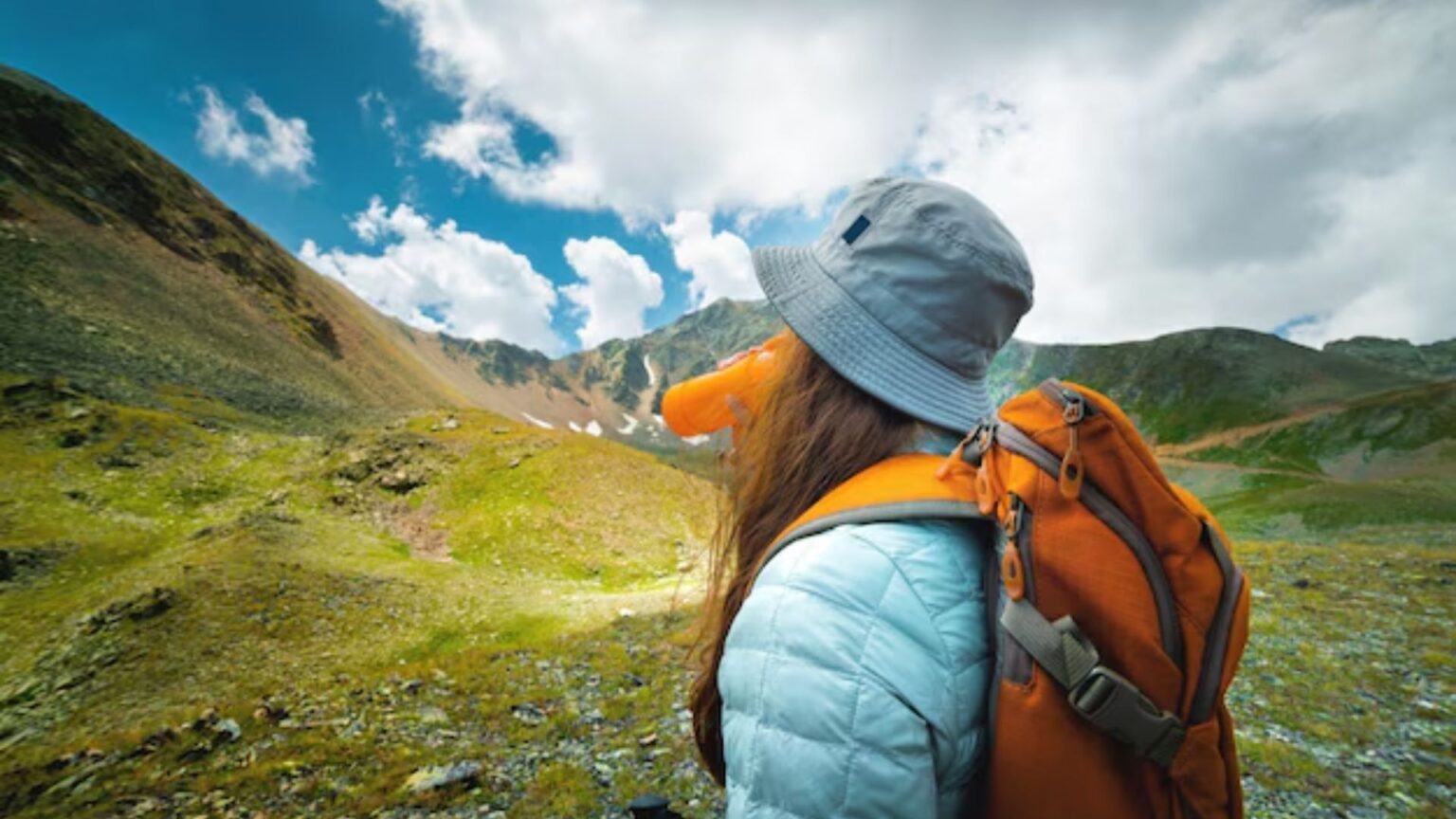 Female backpacker in teh mountains