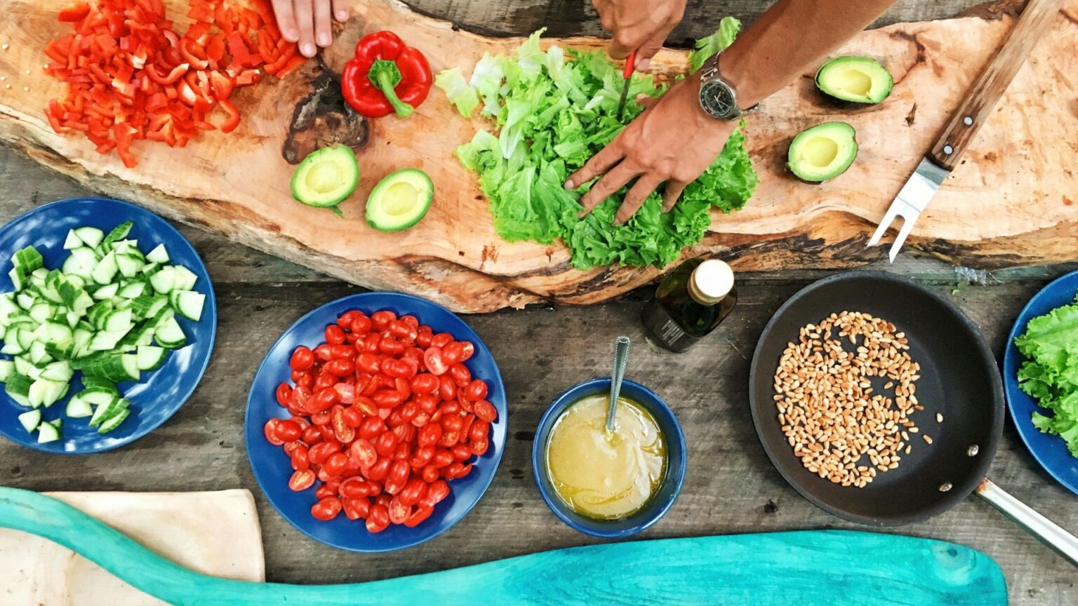 Table of colorful vegetables being prepared